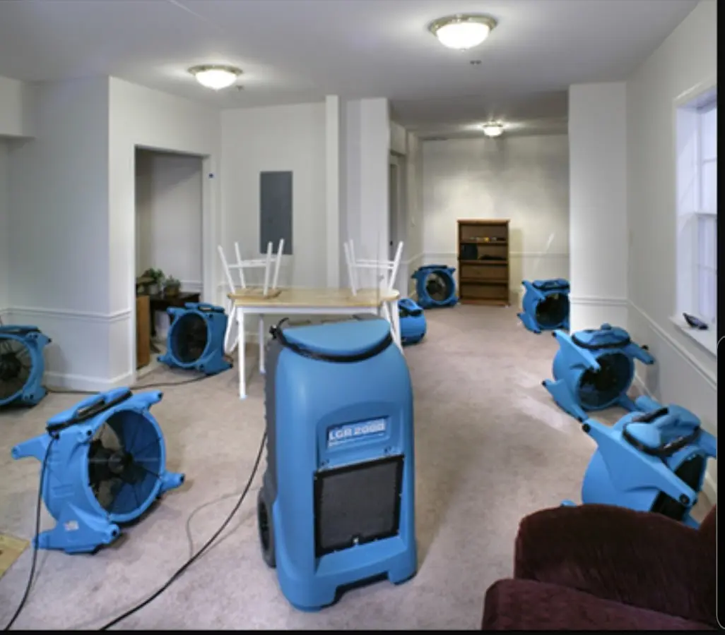 Air movers and dehumidifier setup for Water Damage Restoration in Dillon